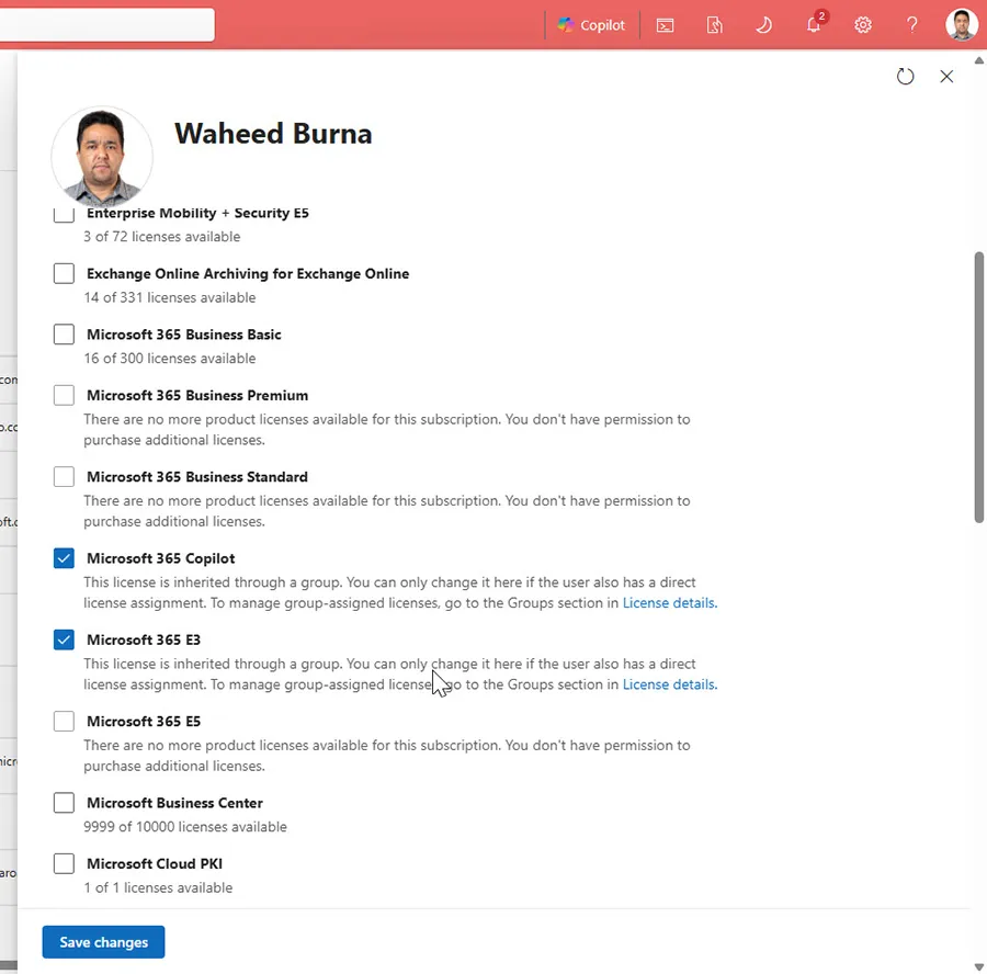Microsoft 365 Admin Center Users page showing the Licenses and apps tab for a user account, with Microsoft 365 Copilot license assigned and visible in the licenses list